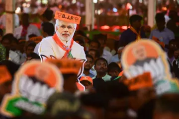 <p>BJP supporters during an election rally</p>- India TV Hindi