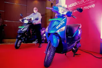 Hero Electric India CEO Sohinder Gill poses with a newly launched electric two-wheeler- India TV Paisa
