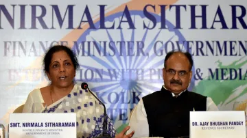 Union Finance Minister Nirmala Sitharaman with UIDAI CEO Ajay Bhushan Pandey during a press conferen- India TV Paisa