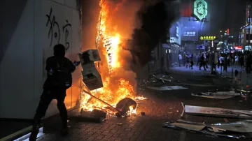 Hong Kong protests: Resurgent protesters stage huge rally, violence erupts again | AP- India TV Hindi