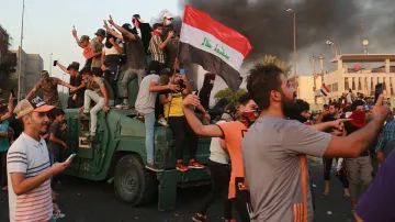Iraqi protests: Death toll rises to 28 people as unrest spreads across south | AP- India TV Hindi
