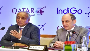 IndiGo CEO Ronojoy Dutta (L) with Qatar Airways' CEO Akbar Al Bake during a business announcement of- India TV Paisa