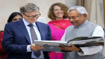 Bihar Chief Minister Nitish Kumar with Microsoft Corp. co-founder Bill Gates during a meeting, in Pa- India TV Paisa