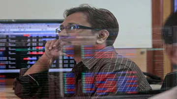Sensex retreats from lifetime high, ends 68 pts lower; Nifty above 12K- India TV Paisa
