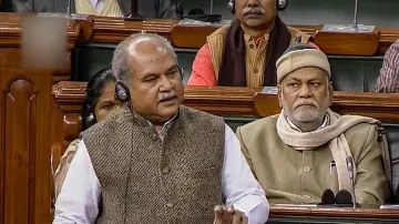  Union Agriculture Minister Narendra Singh Tomar speaks in the Lok Sabha during the ongoing Winter S- India TV Paisa