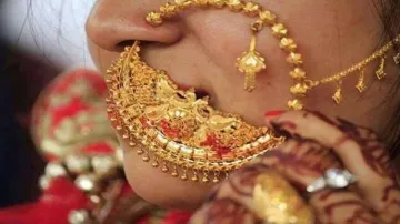 Gold Rate Today: Gold slides by Rs 80, silver falls Rs 200- India TV Paisa