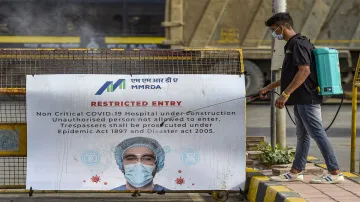 <p>Mumbai: A worker sanitises outside India's first open...- India TV Hindi