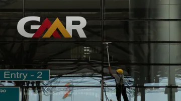 GMR Group cuts employees' salary by up to 50 percent due to COVID-19- India TV Paisa
