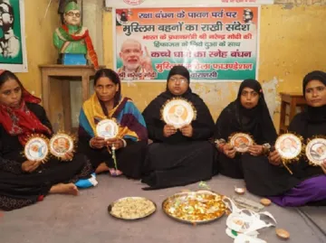 Muslim women tie rakhi to Prime Minister Narendra Modi's photo in Varanasi- India TV Hindi