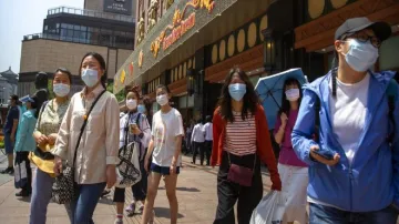 COVID-19: Beijing city says face masks not required outdoors- India TV Hindi