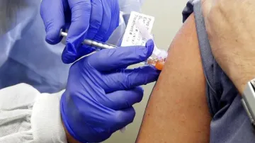 Gujarat coronavirus, Gujarat coronavirus vaccine, man infected coronavirus vaccine- India TV Hindi