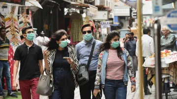 Wearing two fitted masks may double protection against COVID-19: Study- India TV Hindi
