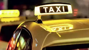 <p>taxi</p>- India TV Paisa
