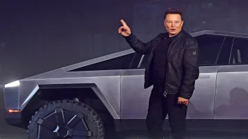 Elon musk's Tesla applies brakes on Bitcoin for vehicle purchases- India TV Paisa