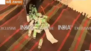 Shocking wastage of Covid vaccine in Rajasthan, vials found dumped in garbage bin- India TV Hindi
