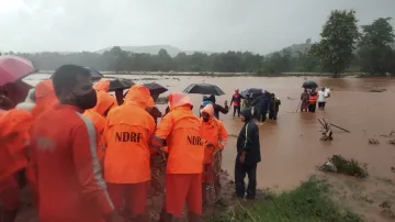 NDRF team carry out rescue work in flood-hit Chiplun in Ratnagiri district of Maharashtra, following- India TV Hindi