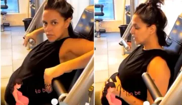 Pregnant Neha Dhupia doing workout in gym husband Angad Bedi shares video on instagram - India TV Hindi