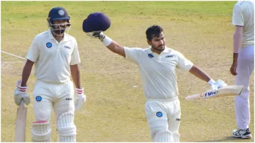 Jharkhands batsman Virat Singh celebrates after scoring a century on the 1st day of Ranji Trophy - India TV Hindi