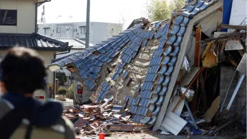 A damaged house is seen following an earthquake in Kunimi, Fukushima - India TV Hindi