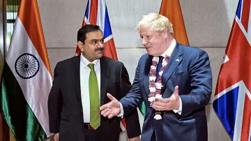 <p>Gautam Adani with Boris Johnson </p>- India TV Paisa