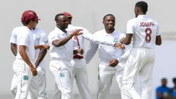 <p>West Indies players celebrate a wicket against...- India TV Hindi