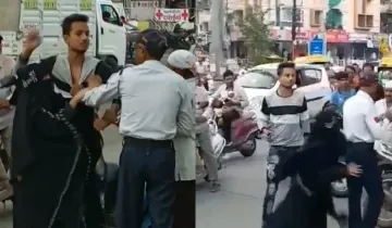 Indore : Traffic policeman beaten up - India TV Hindi