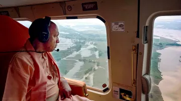 CM Yogi inspecting the rain affected areas- India TV Hindi