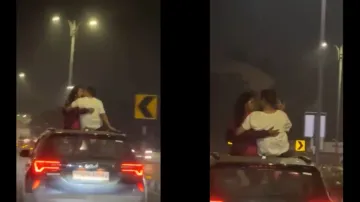 चलती कार में KISS करता कपल- India TV Hindi