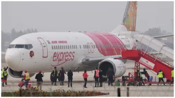  Air India Express flight caught fire in engine 179 passengers evacuated safely after landing on ben- India TV Hindi