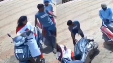 पेट्रोल पंप कर्मचारी को स्कूटी से टक्कर मारते हुए लड़की- India TV Hindi