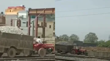 पटरी पर ट्रैक्टर दौड़ाते दिखाई दिया शख्स- India TV Hindi