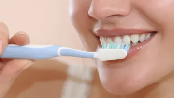 Side effects of not brushing teeth at night- India TV Hindi