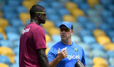 Stuart Law and Jason Holder | Getty Images- India TV Hindi