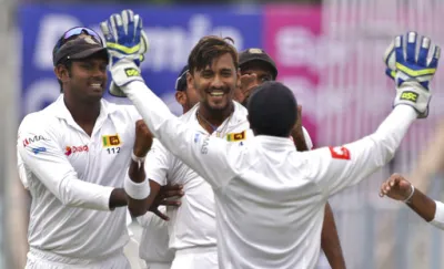 Suranga Lakmal celebrates with teammates the dismissal of...- India TV Hindi