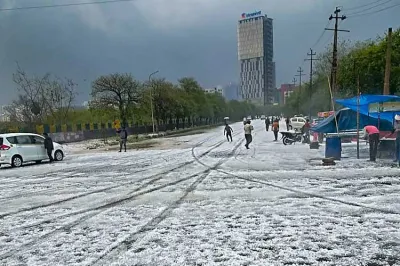 <p>A view of a street after hailstorm struck various parts...- India TV Hindi