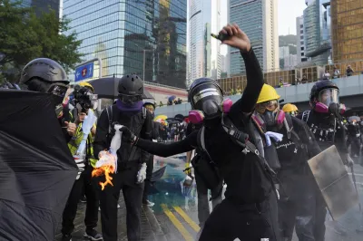 <p>An anti-government protester throws a Molotov cocktail...- India TV Hindi