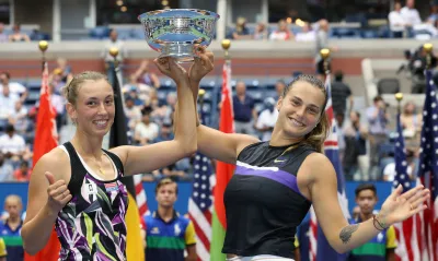 Elise Mertens (L) of Belgium and Aryna Sabalenka of Belarus pose with the trophy - India TV Hindi