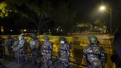 Security personnel stand guard after a minor IED blast outside the Israeli Embassy, in New Delhi on - India TV Hindi