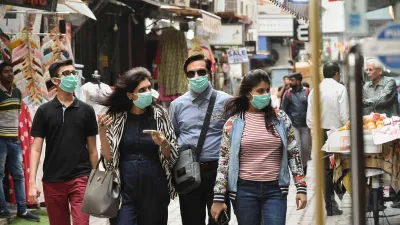 Wearing two fitted masks may double protection against COVID-19: Study- India TV Hindi