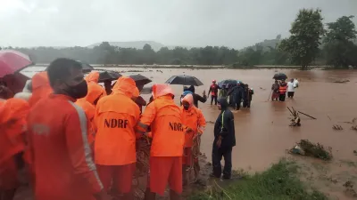 NDRF team carry out rescue work in flood-hit Chiplun in Ratnagiri district of Maharashtra, following- India TV Hindi