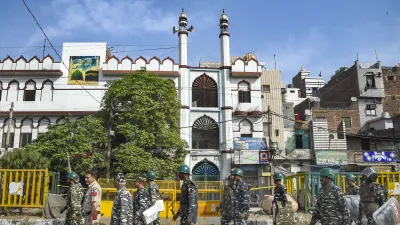 Security personnel patrol in the violence-hit Jahangirpuri area, in New Delhi- India TV Hindi