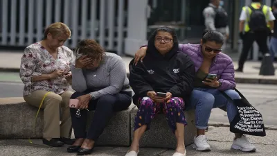 People gather outside after a magnitude 7.6 earthquake was felt in Mexico City- India TV Hindi