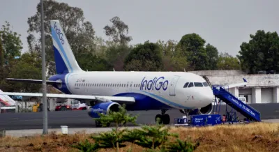 Smoking in Indigo Flight man smoking cigarette in assam to bengaluru flight Indigo flight police arr- India TV Hindi