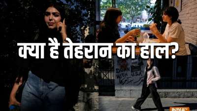 ईरान की राजधानी तेहरान में शनिवार को रोजमर्रा की जिंदगी सामान्य नजर आई। इस्लामिक रिवोल्यूशन स्ट्रीट पर लोग आते-जाते दिखे, जबकि शहर की दीवारों पर राजनीतिक संदेश और तस्वीरें भी नजर आईं। ईरान की राजधानी तेहरान में शनिवार को रोजमर्रा की जिंदगी सामान्य नजर आई। इस्लामिक रिवोल्यूशन स्ट्रीट पर लोग आते-जाते दिखे, जबकि शहर की दीवारों पर राजनीतिक संदेश और तस्वीरें भी नजर आईं।