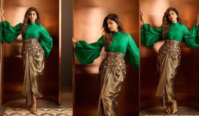 अगर आप अपने फेस्टिव वॉर्डरोब में सिंपल लहंगे और साड़ियों से हटकर कुछ नया आजमाना चाहती हैं तो शिल्पा शेट्टी का ये लुक आप भी कॉपी कर सकते हैं। शिल्पा शेट्टी हमेशा अपने लुक्स को लेकर चर्चा में रहते हैं और अपने नए लिक से उन्होंने एक बार फिर से यह साबित कर दिया। एक्ट्रेस ने हाल ही में इंस्टाग्राम पर एमरल्ड-ग्रीन और ब्रॉन्ज-गोल्ड रंग के शानदार आउटफिट में अपनी कुछ तस्वीरें शेयर कीं, जिसमें एक खास जूलरी-स्टाइल बेल्ट ने पूरे लुक को एक साथ खूबसूरती से जोड़ा। अगर आप अपने फेस्टिव वॉर्डरोब में सिंपल लहंगे और साड़ियों से हटकर कुछ नया आजमाना चाहती हैं तो शिल्पा शेट्टी का ये लुक आप भी कॉपी कर सकते हैं। शिल्पा शेट्टी हमेशा अपने लुक्स को लेकर चर्चा में रहते हैं और अपने नए लिक से उन्होंने एक बार फिर से यह साबित कर दिया। एक्ट्रेस ने हाल ही में इंस्टाग्राम पर एमरल्ड-ग्रीन और ब्रॉन्ज-गोल्ड रंग के शानदार आउटफिट में अपनी कुछ तस्वीरें शेयर कीं, जिसमें एक खास जूलरी-स्टाइल बेल्ट ने पूरे लुक को एक साथ खूबसूरती से जोड़ा।