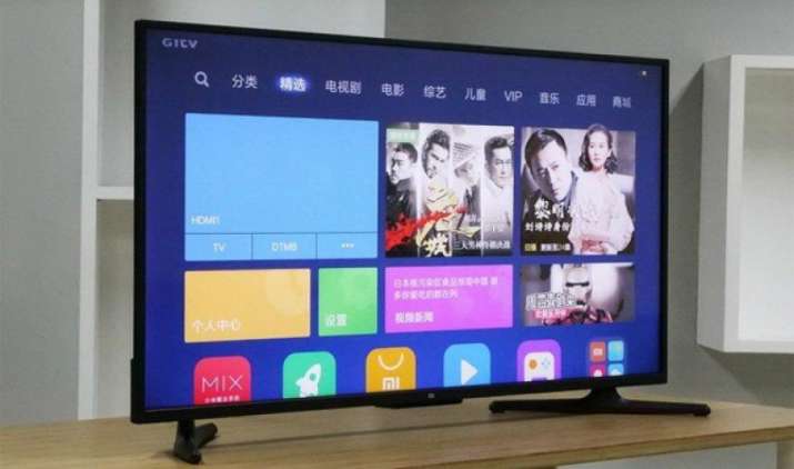 Xiaomi ने लॉन्च किया सबसे सस्ता स्मार्ट TV, आर्टिफिशियल इंटेलीजेंस और वॉयस रिकग्निशन फीचर से है लैस Xiaomi ने लॉन्च किया सबसे सस्ता स्मार्ट TV, आर्टिफिशियल इंटेलीजेंस और वॉयस रिकग्निशन फीचर से है लैस- India TV Paisa