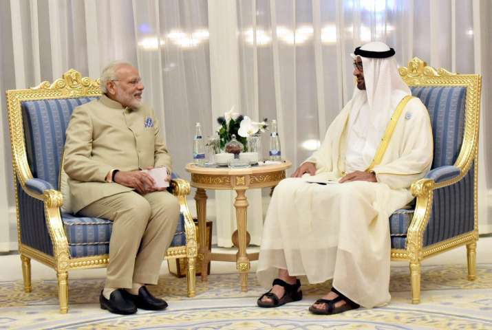 PM Modi in Abu Dhabi with crown prince Mohamed bin Zayed Al Nahyan PM Modi in Abu Dhabi with crown prince Mohamed bin Zayed Al Nahyan- India TV Paisa