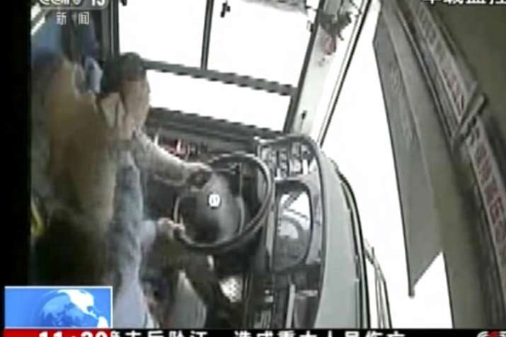 China: brawl between passenger and driver, bus plunged into river, 13 killed China: brawl between passenger and driver, bus plunged into river, 13 killed - India TV Hindi