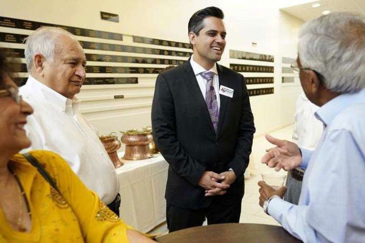 Democrat for Congress candidate Sri Kulkarni (centre) | AP Democrat for Congress candidate Sri Kulkarni (centre) | AP- India TV