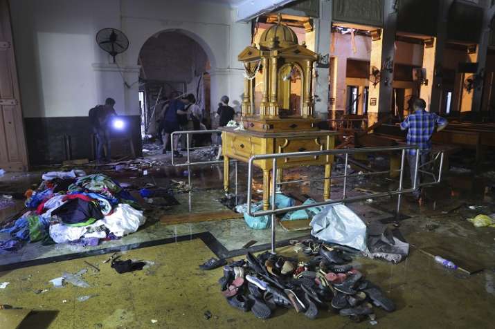 Shoes and other belongings left by panicked worshippers... Shoes and other belongings left by panicked worshippers...- India TV